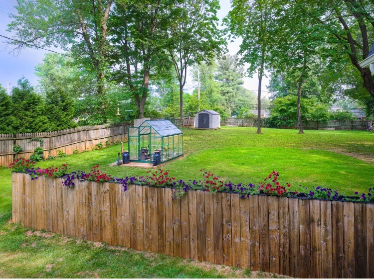 319 West Conestoga Road Devon, PA 19333 - Photo 8 of 38 a view of a backyard with wooden fence