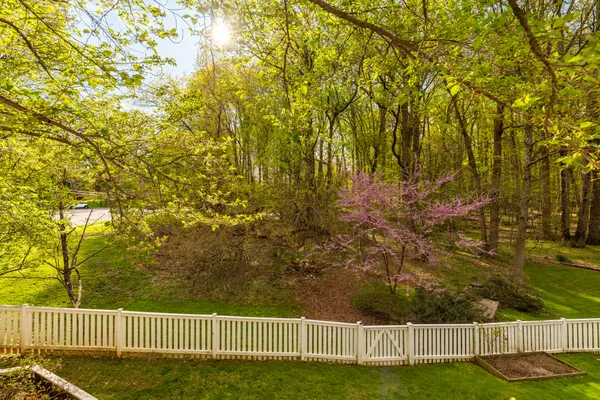 a front view of a building with sitting area