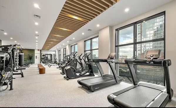 a view of a room with gym equipment