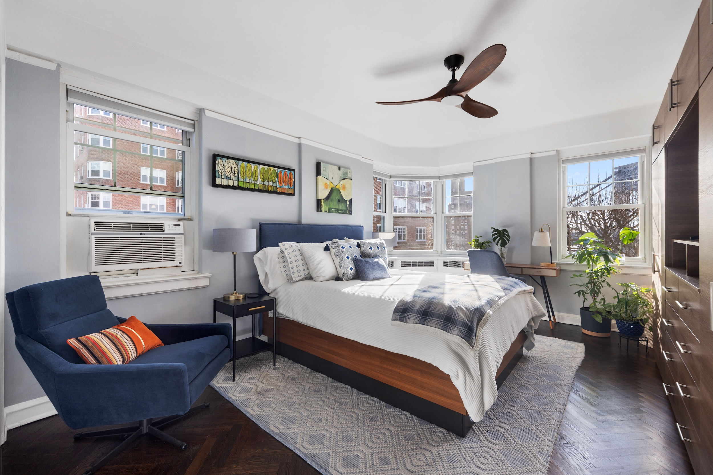 160 Cabrini Boulevard, Unit 22 Manhattan, NY 10033 - Photo 6 of 23 a spacious bedroom with a bed and a couch