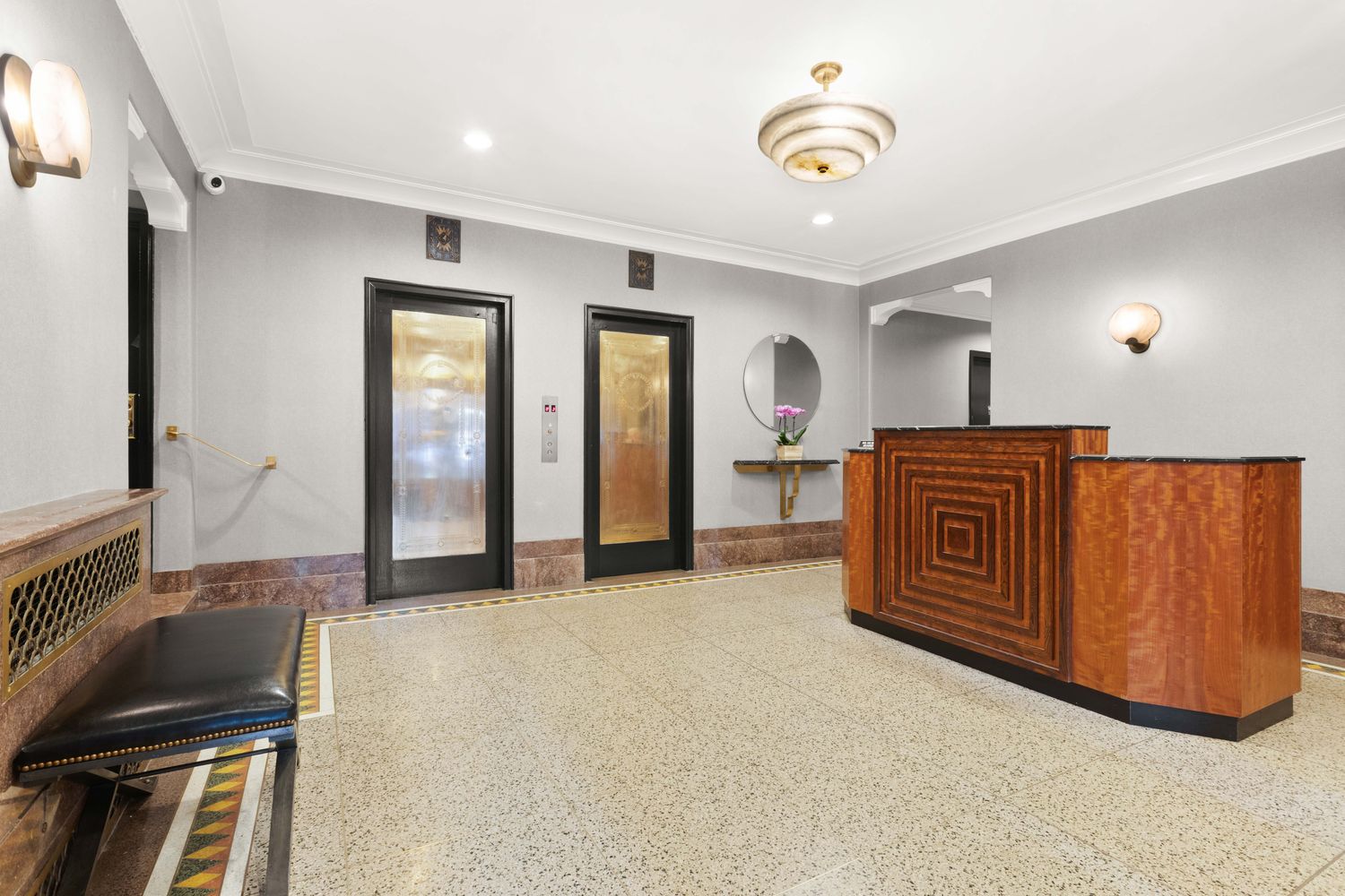200 West 20th Street, Unit 906 Manhattan, NY 10011 - Photo 6 of 8 a view of an empty room with a fireplace