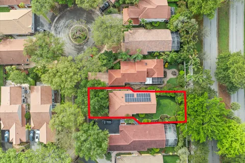 an aerial view of house with yard