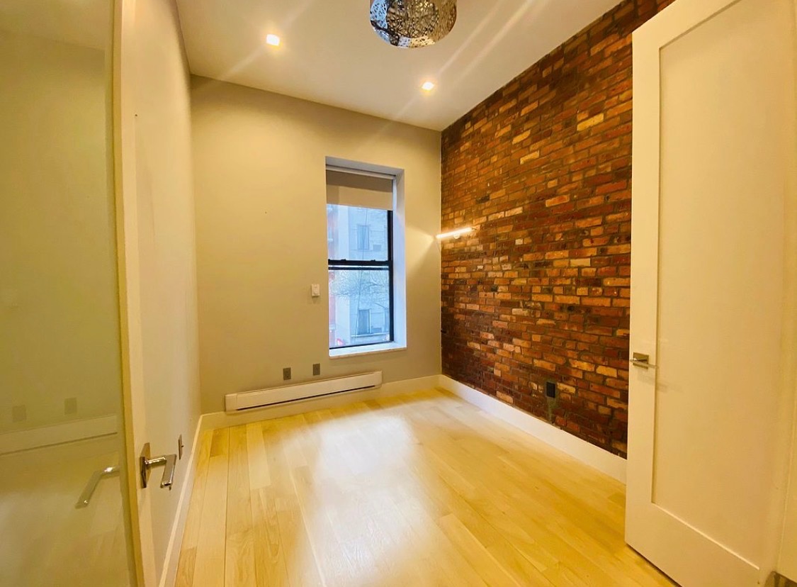 133 East 35th Street, Unit 3 Manhattan, NY 10016 - Photo 15 of 16 a view of an empty room with a window