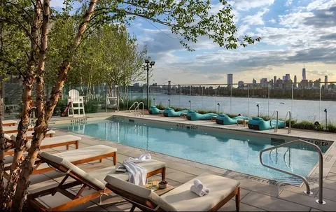 a outdoor space with lots of tables and chairs