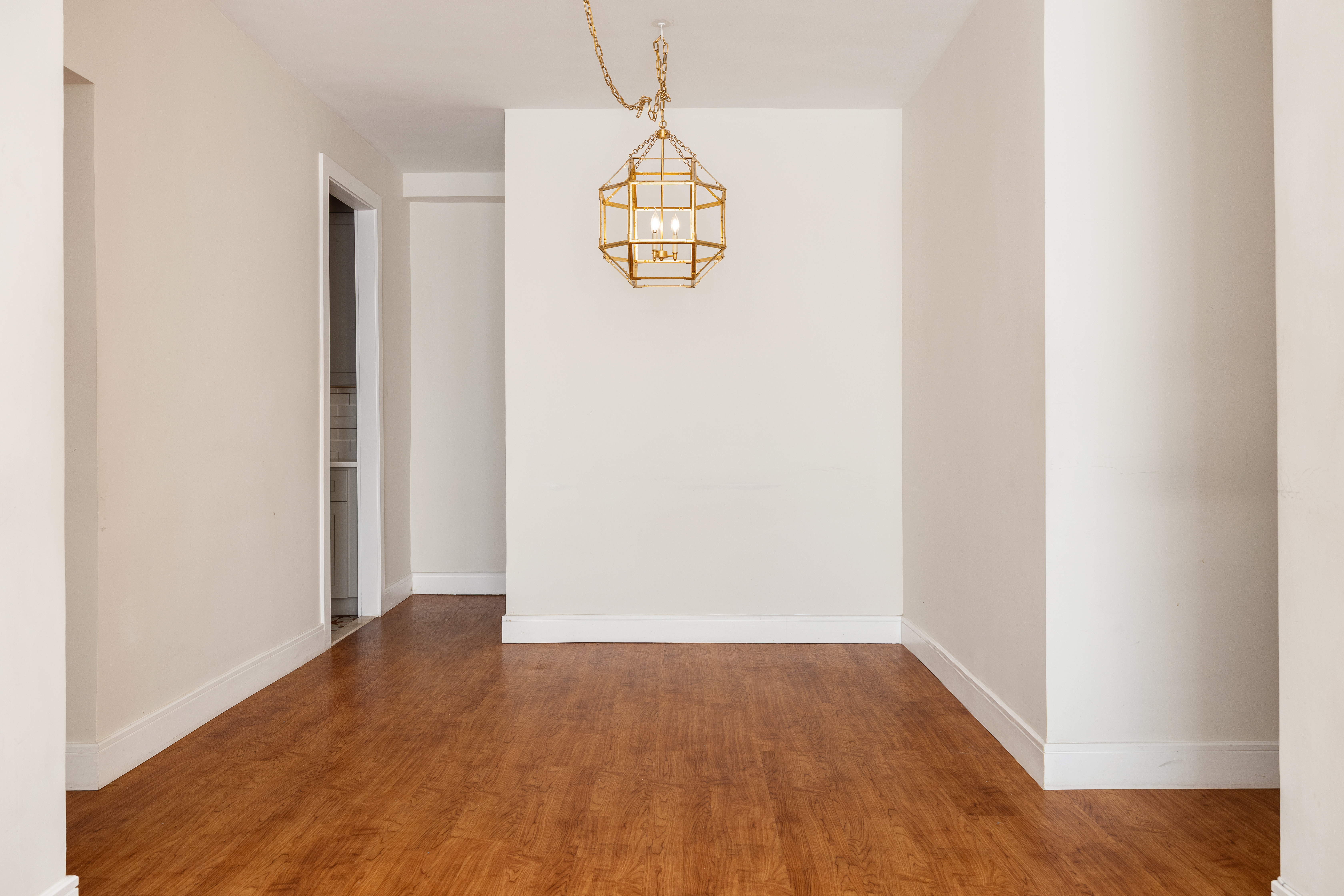 60 East 8th Street, Unit 20P Manhattan, NY 10003 - Photo 3 of 11 a view of an empty room with wooden floor