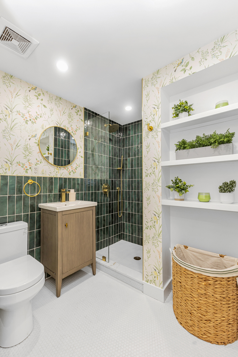 1050 Sterling Place Brooklyn, NY 11213 - Photo 10 of 23 a bathroom with a sink a toilet and shower