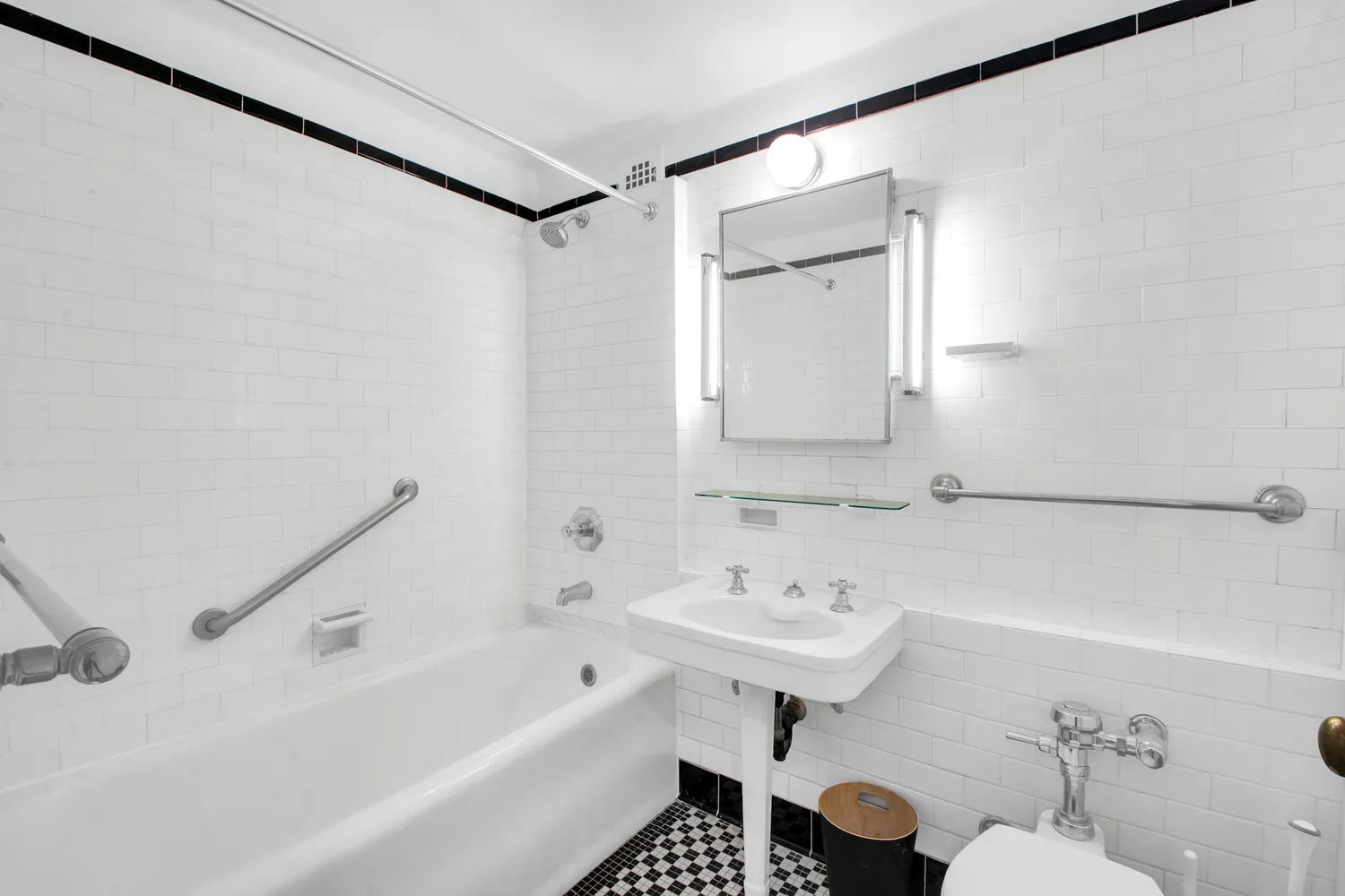 a bathroom with a sink and a bathtub