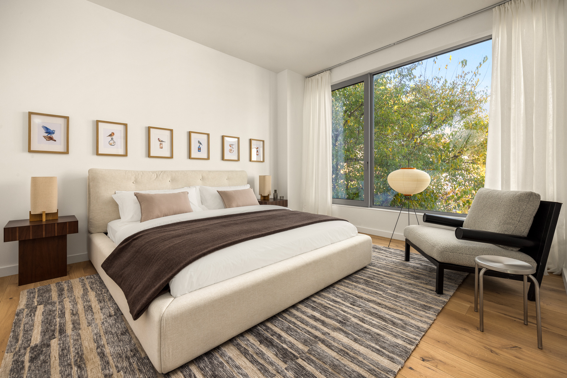 584 Leonard Street, Unit PHB Brooklyn, NY 11222 - Photo 11 of 22 a bedroom with a bed and a window