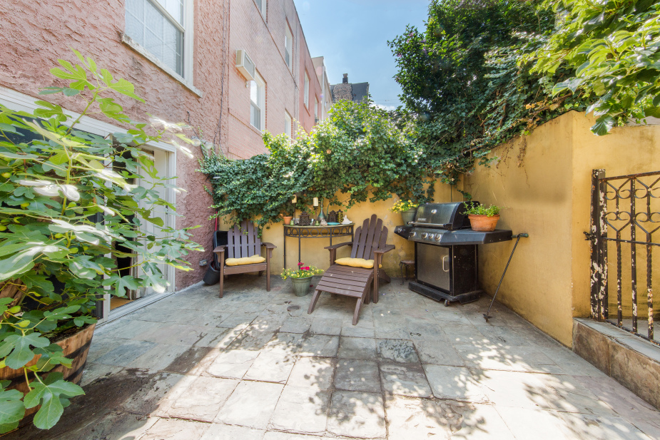 110 North 9th Street, Unit TH1 Brooklyn, NY 11249 - Photo 11 of 14 a view of a patio with table and chairs and potted plants