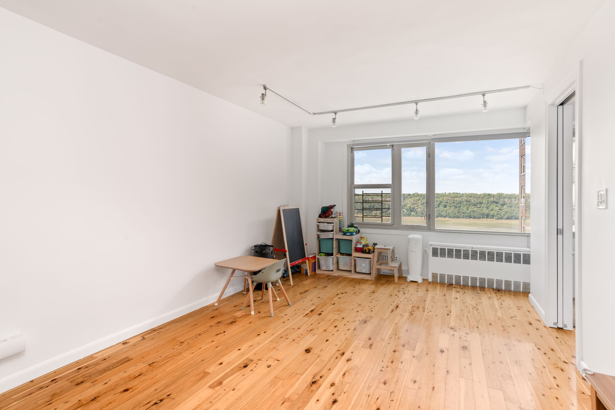 900 West 190th Street, Unit 11J Manhattan, NY 10040 - Photo 6 of 15 a workspace with a window
