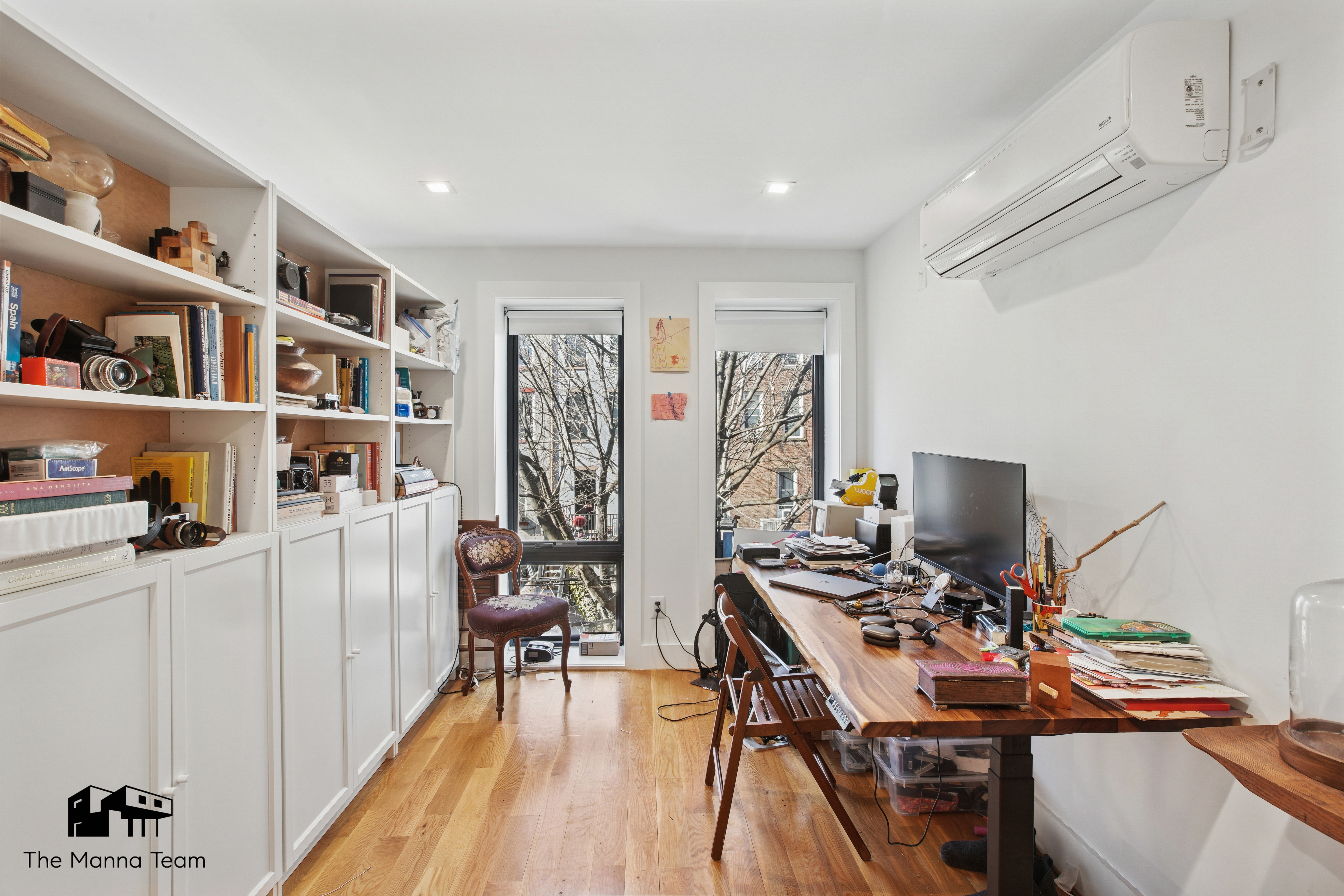 385 Jefferson Avenue, Unit C Brooklyn, NY 11221 - Photo 9 of 21 a view of a workspace with furniture and wooden floor