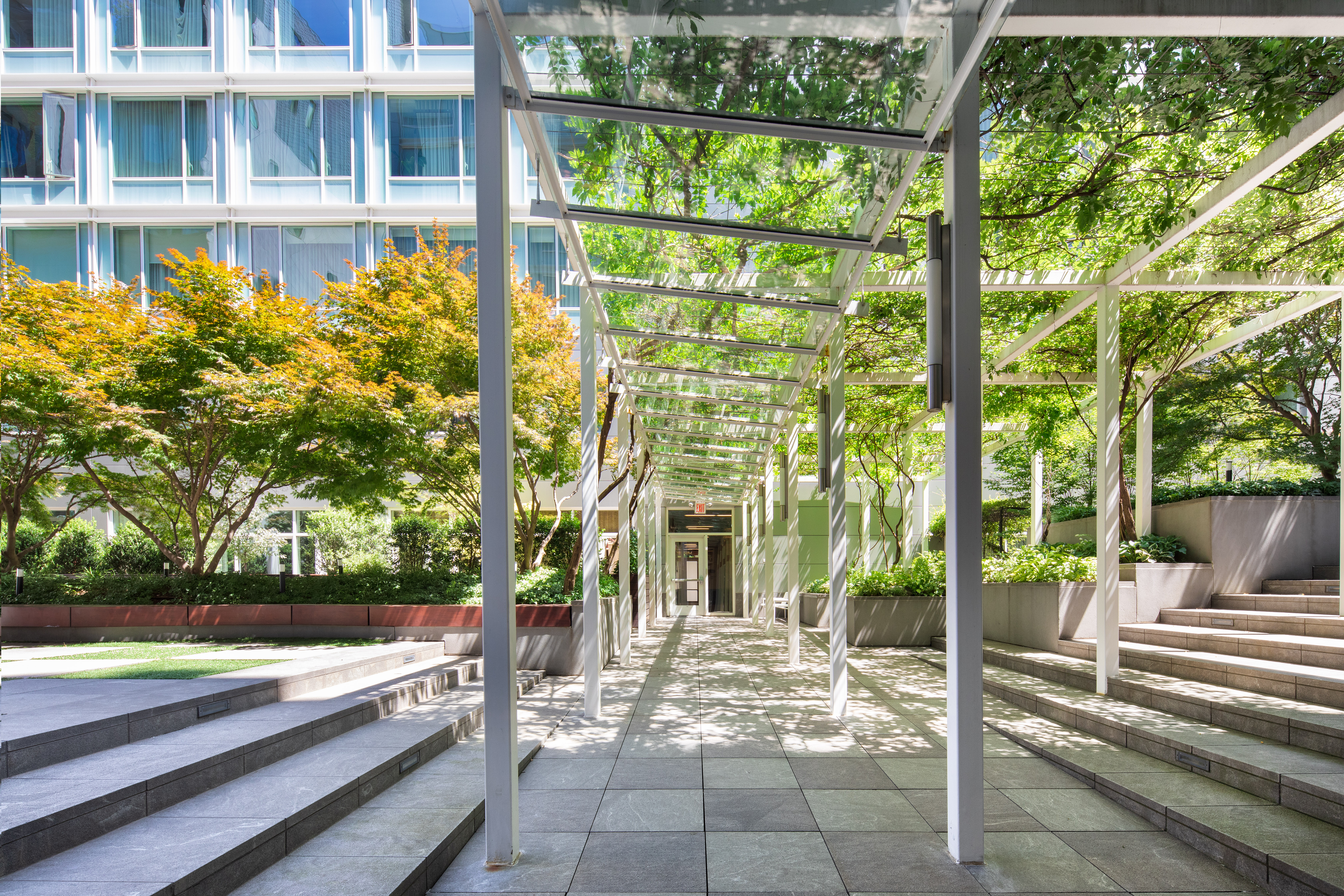 311 West Broadway, Unit 6J Manhattan, NY 10013 - Photo 15 of 19 a view of a bench sitting in front of a building
