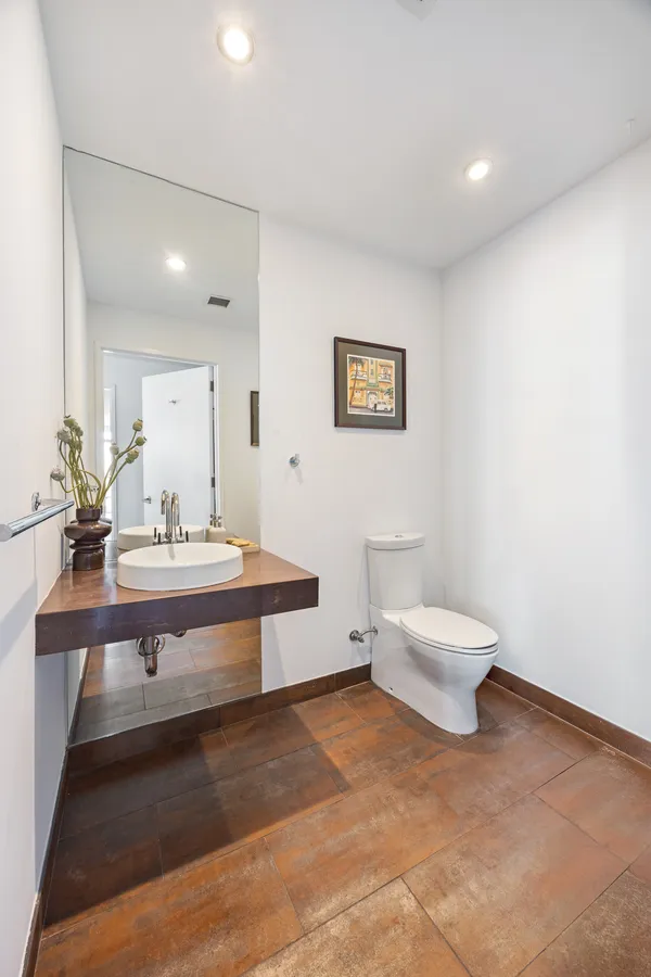 a bathroom with a sink and a toilet