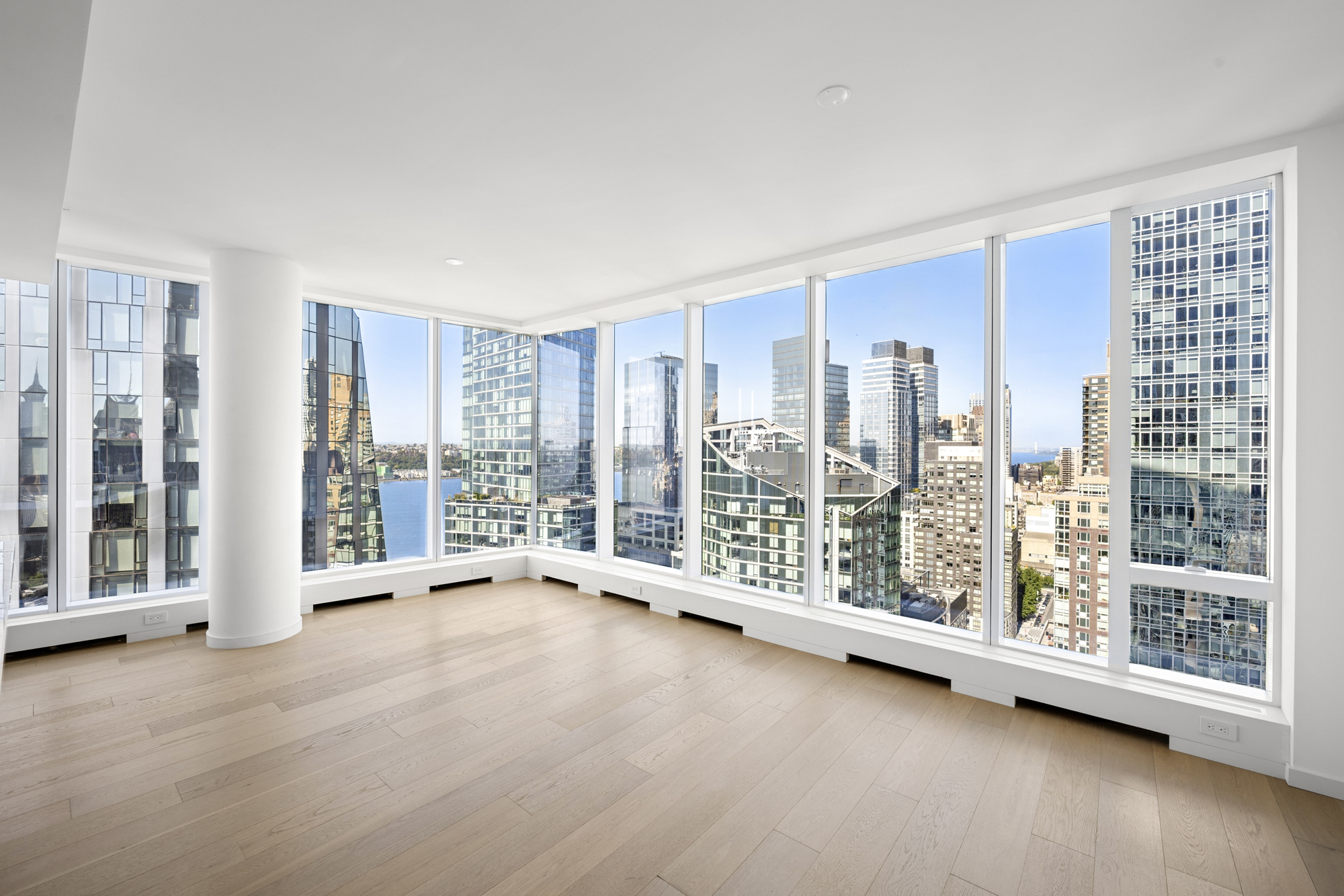 1 West End Avenue, Unit 26G Manhattan, NY 10023 - Photo 2 of 33 a view of room with floor to ceiling window and an outdoor space