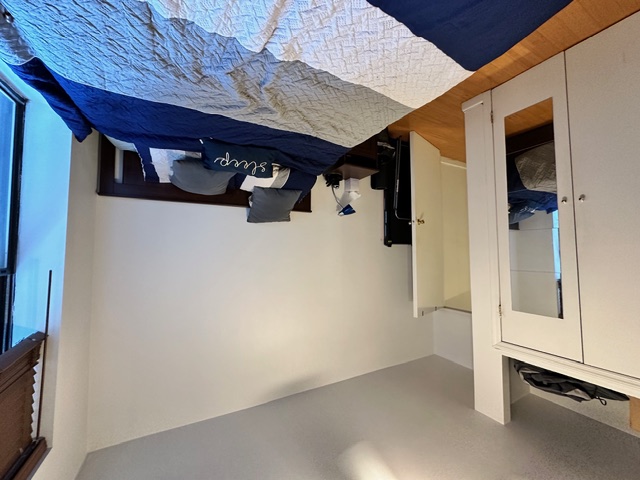 349 West 45th Street, Unit 3RE Manhattan, NY 10036 - Photo 5 of 5 a bedroom with a bed and wooden floor