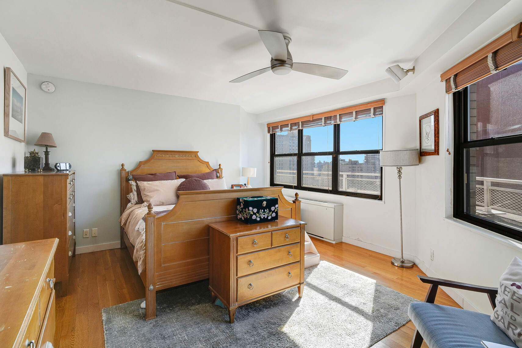 201 East 28th Street, Unit 21BC Manhattan, NY 10016 - Photo 11 of 24 a bedroom with furniture and a window