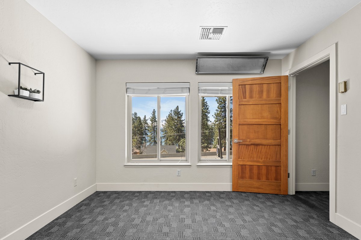 625 Highway 50 Zephyr Cove, NV 89448 - Photo 19 of 38 an empty room with windows and closet