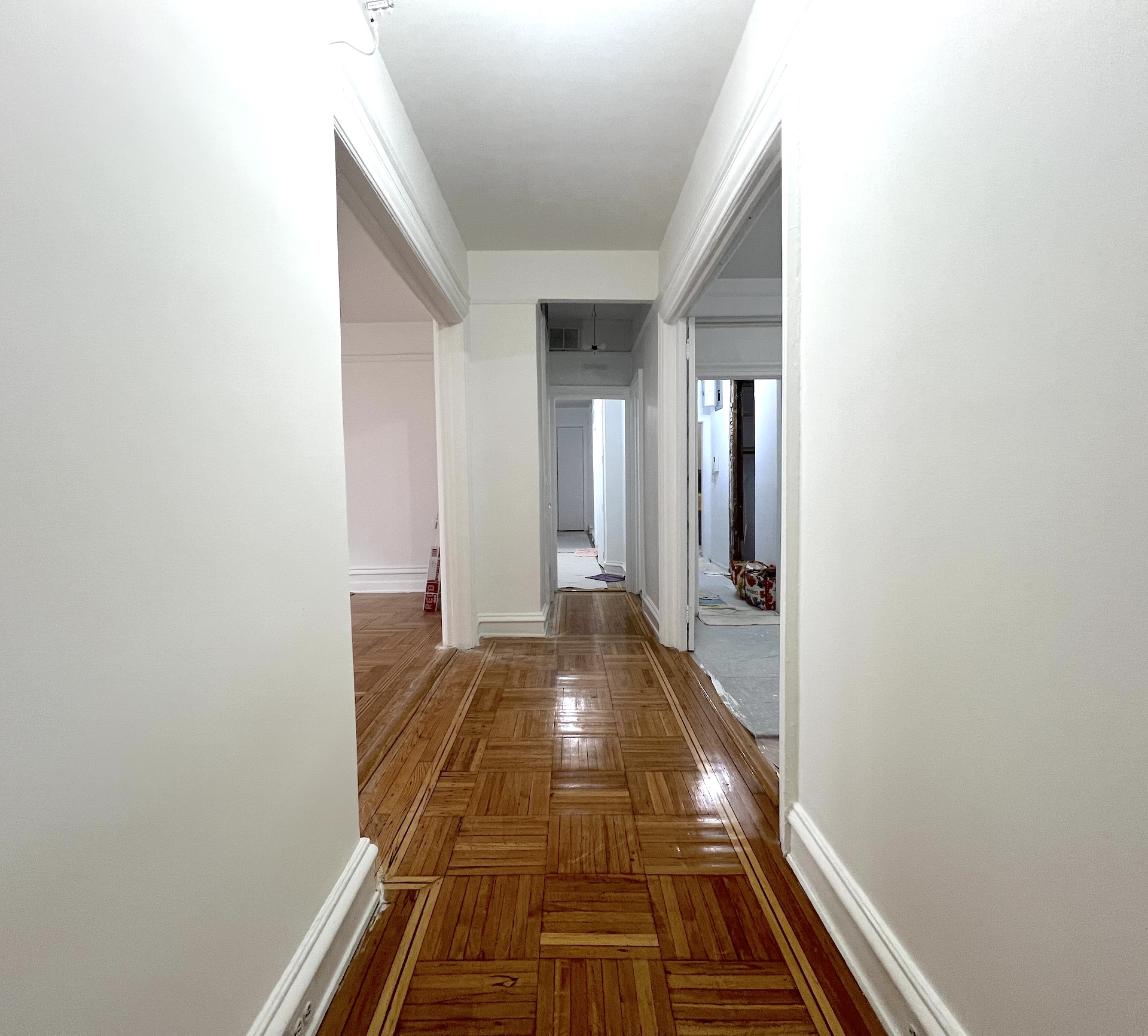 59 Livingston Street, Unit 3A Brooklyn, NY 11201 - Photo 14 of 19 a view of a hallway with wooden floor