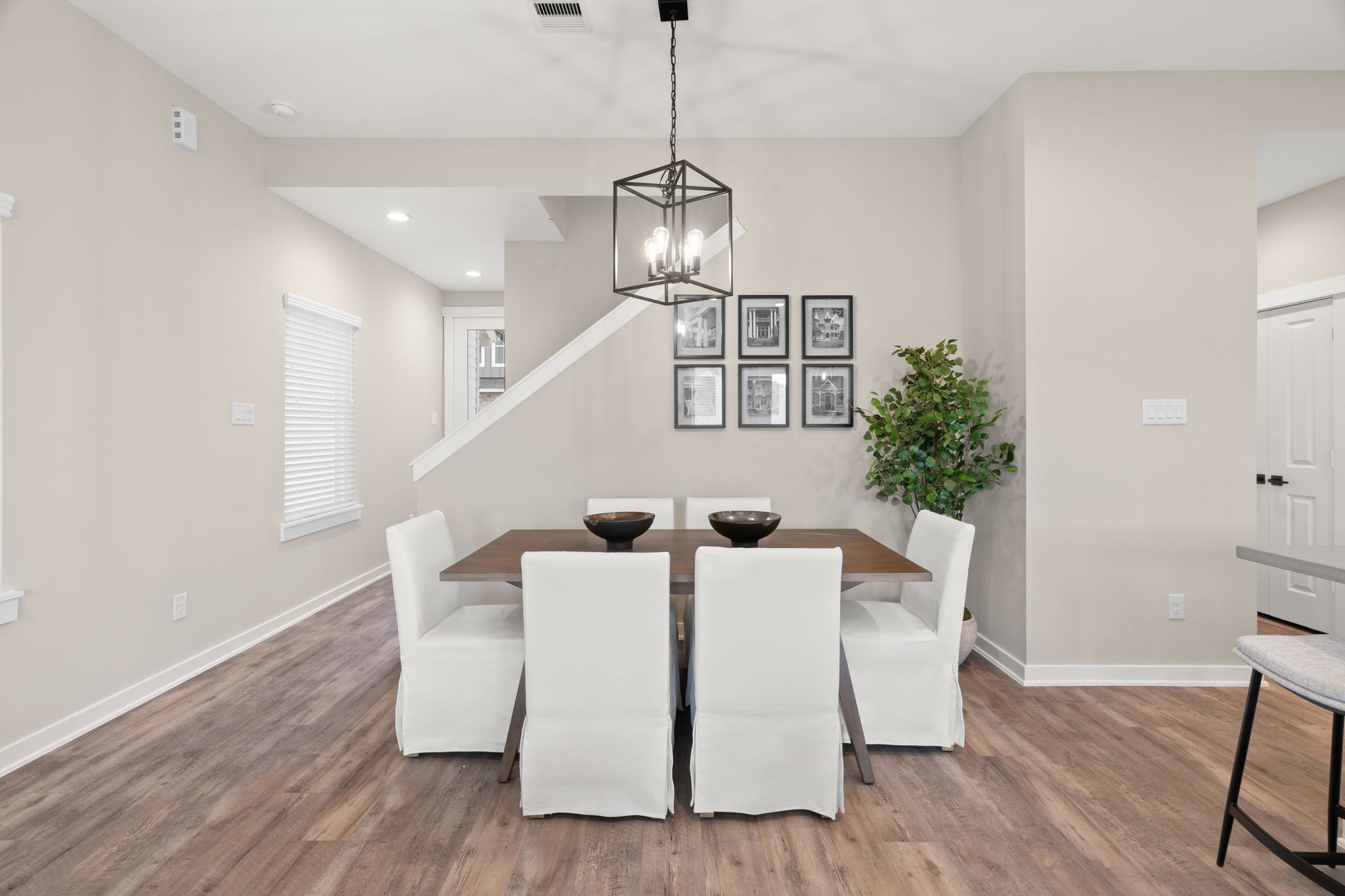 11303 Stonework Grv Lane Houston, TX 77076 - Photo 8 of 39 a living room with furniture and a chandelier