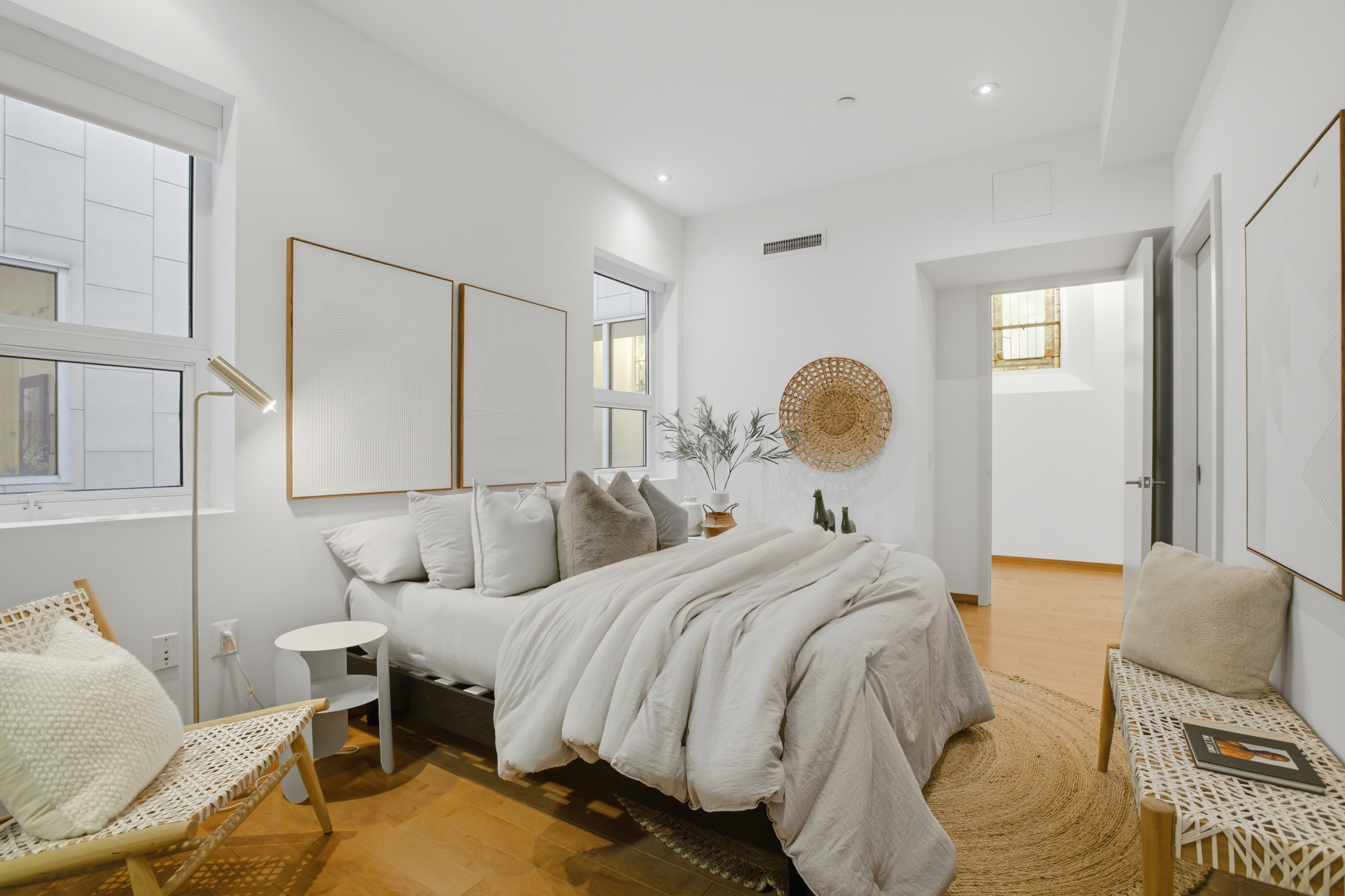 135 West 4th Street, Unit 2W Manhattan, NY 10012 - Photo 16 of 20 a bedroom with a bed and lamp