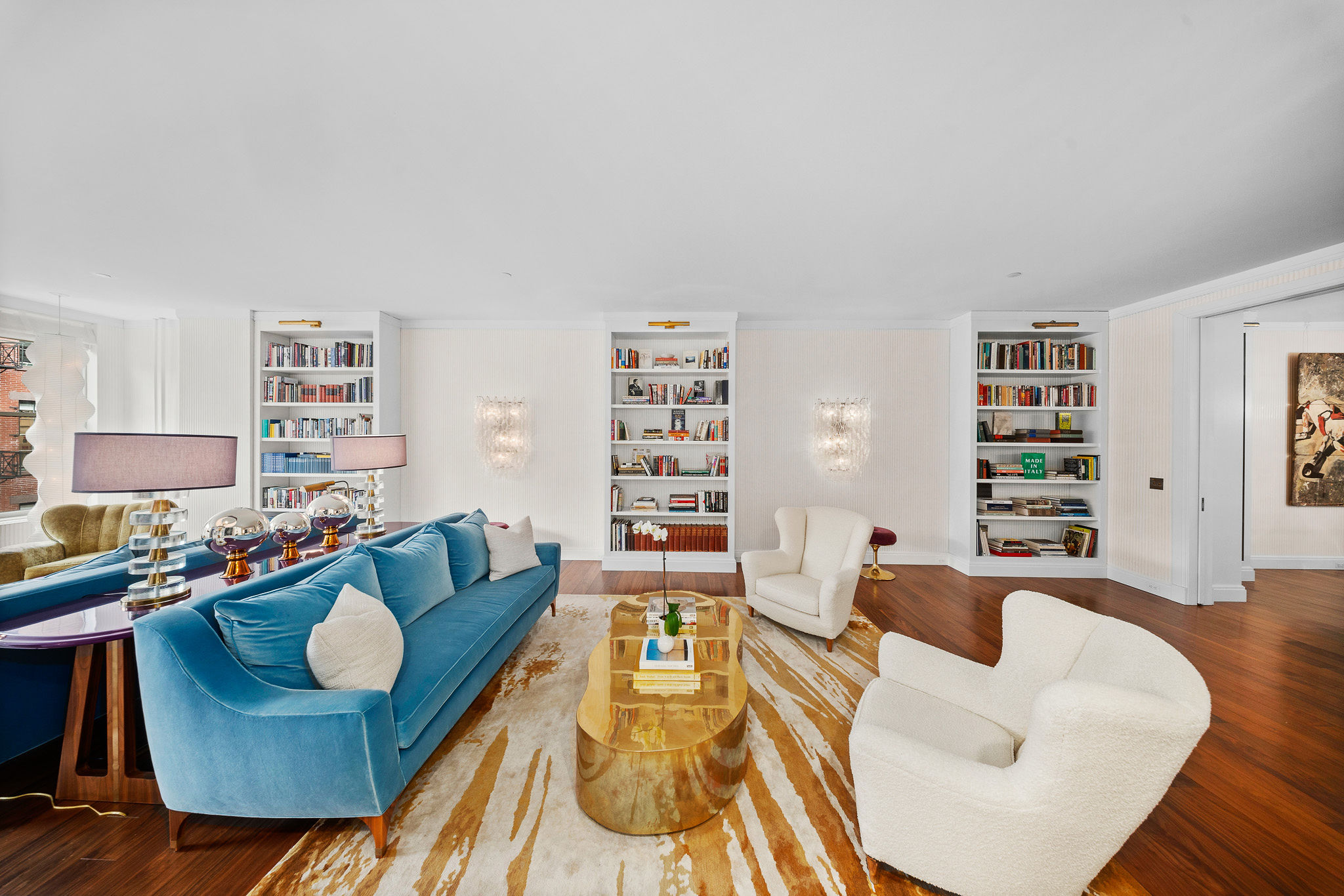 45 Crosby Street, Unit 6 North Manhattan, NY 10012 - Photo 8 of 17 a living room with furniture and a wooden floor
