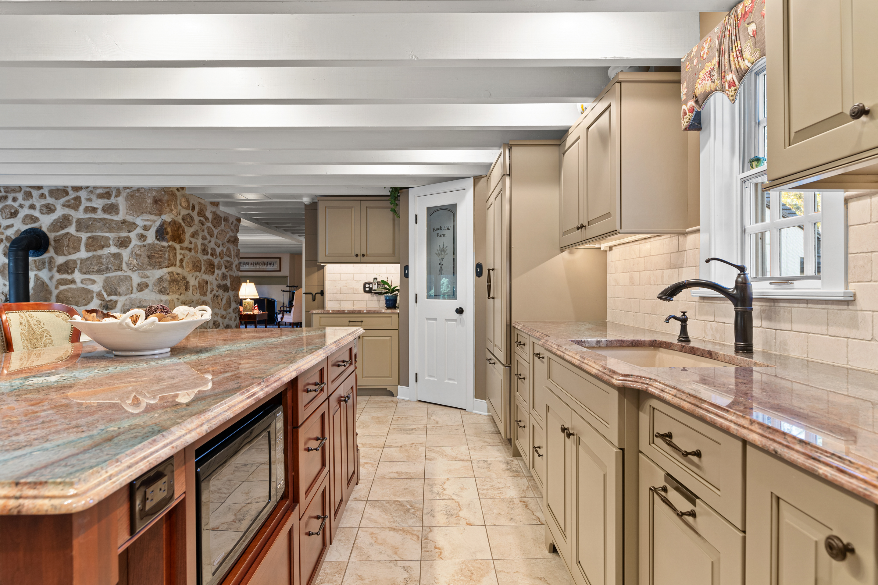 791 Grubbs Mill Road Berwyn, PA 19312 - Photo 14 of 76 a kitchen with stainless steel appliances granite countertop a sink and counter space