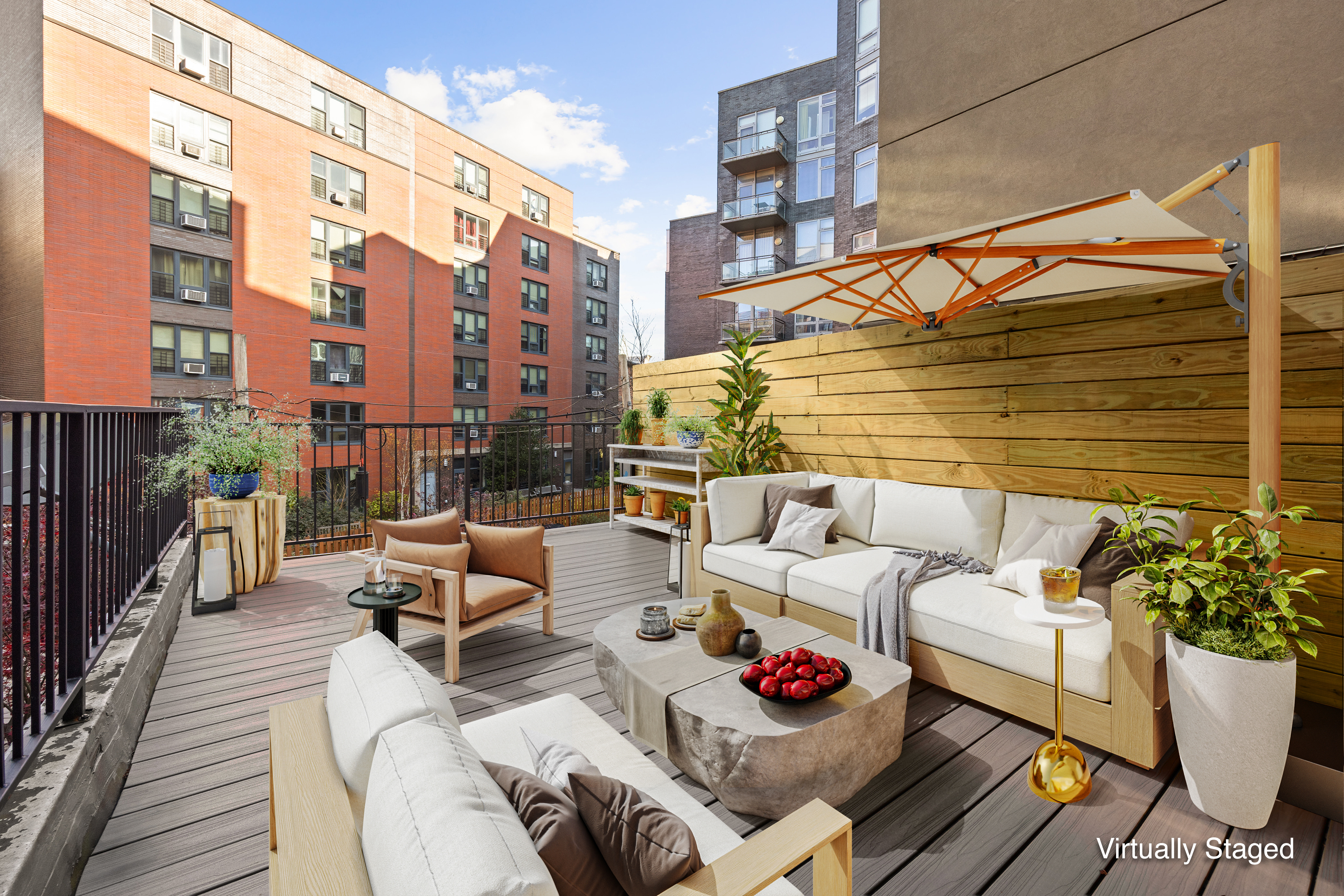 1039 Fulton Street Brooklyn, NY 11238 - Photo 8 of 13 a view of a patio with couches and potted plants
