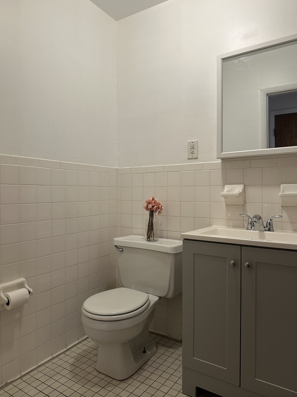 458 West 57th Street, Unit 5FE Manhattan, NY 10019 - Photo 11 of 14 a bathroom with a toilet a sink and mirror
