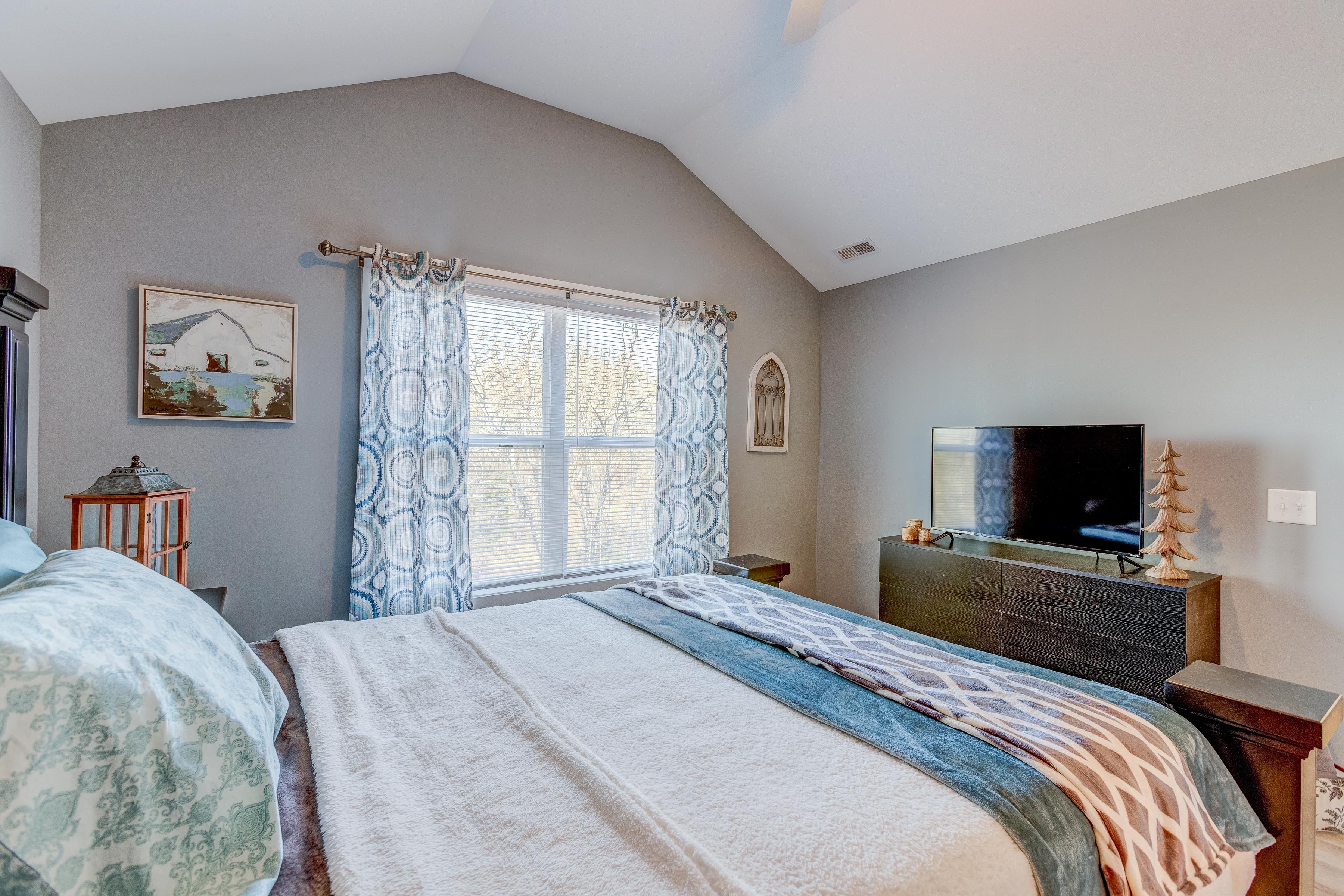 Happy Hollow Road Goodlettsville, TN 37072 - Photo 161 of 203 a bedroom with a bed and a flat screen tv