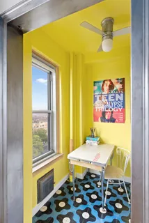 a dining room with a table and chairs