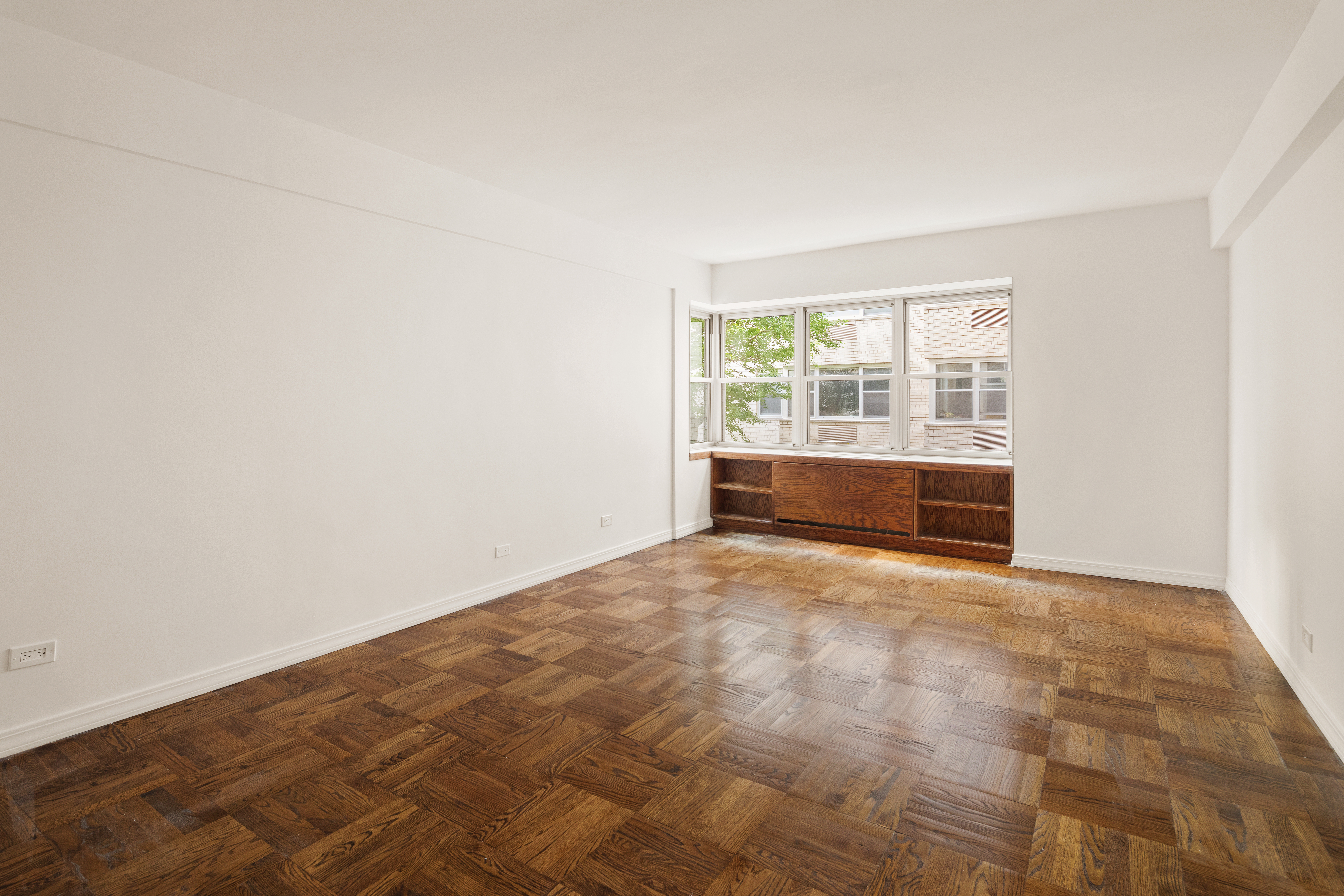 11 5th Avenue, Unit 5LW Manhattan, NY 10003 - Photo 7 of 19 an empty room with windows