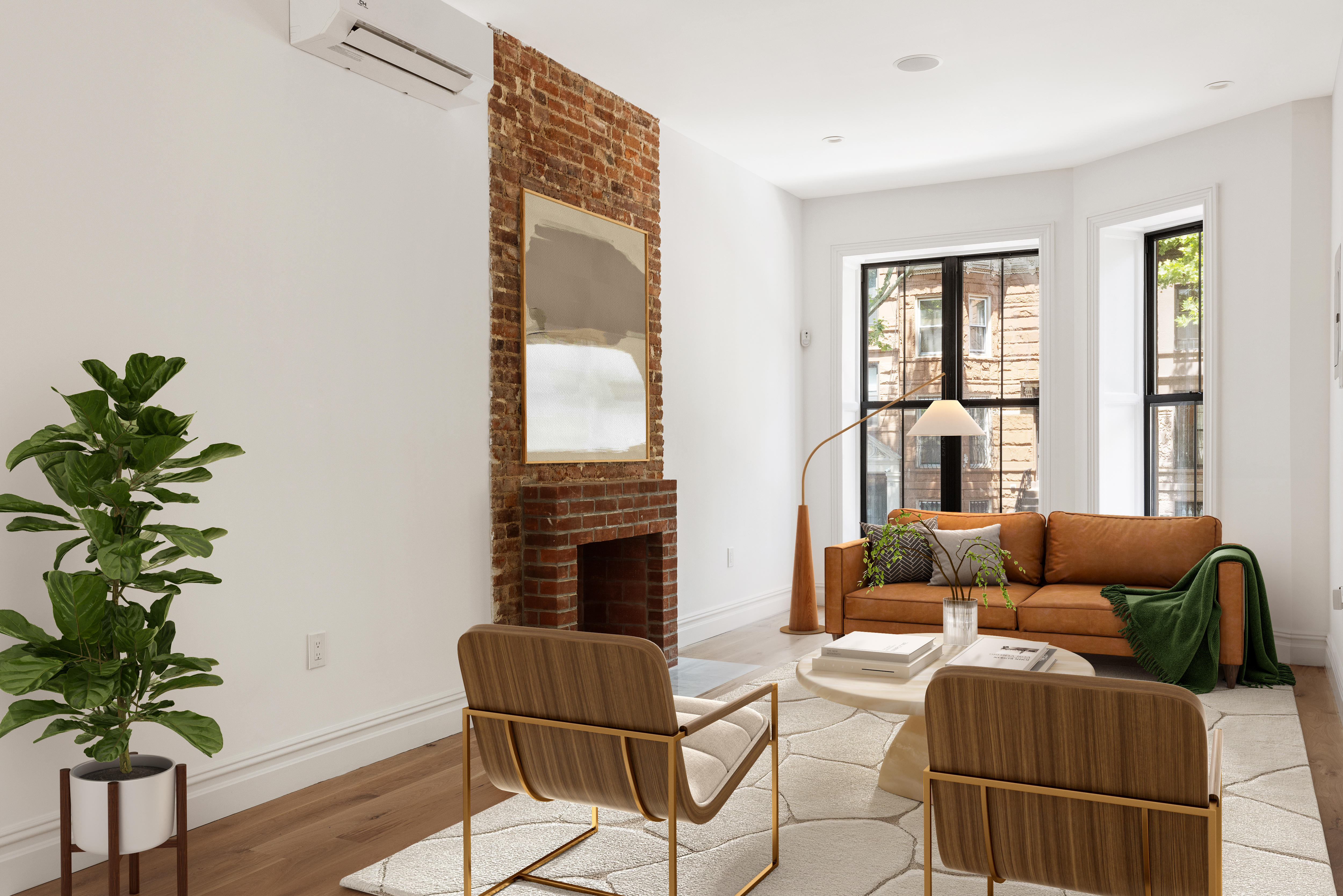 698 Macon Street Brooklyn, NY 11233 - Photo 1 of 17 a living room with furniture and a potted plant