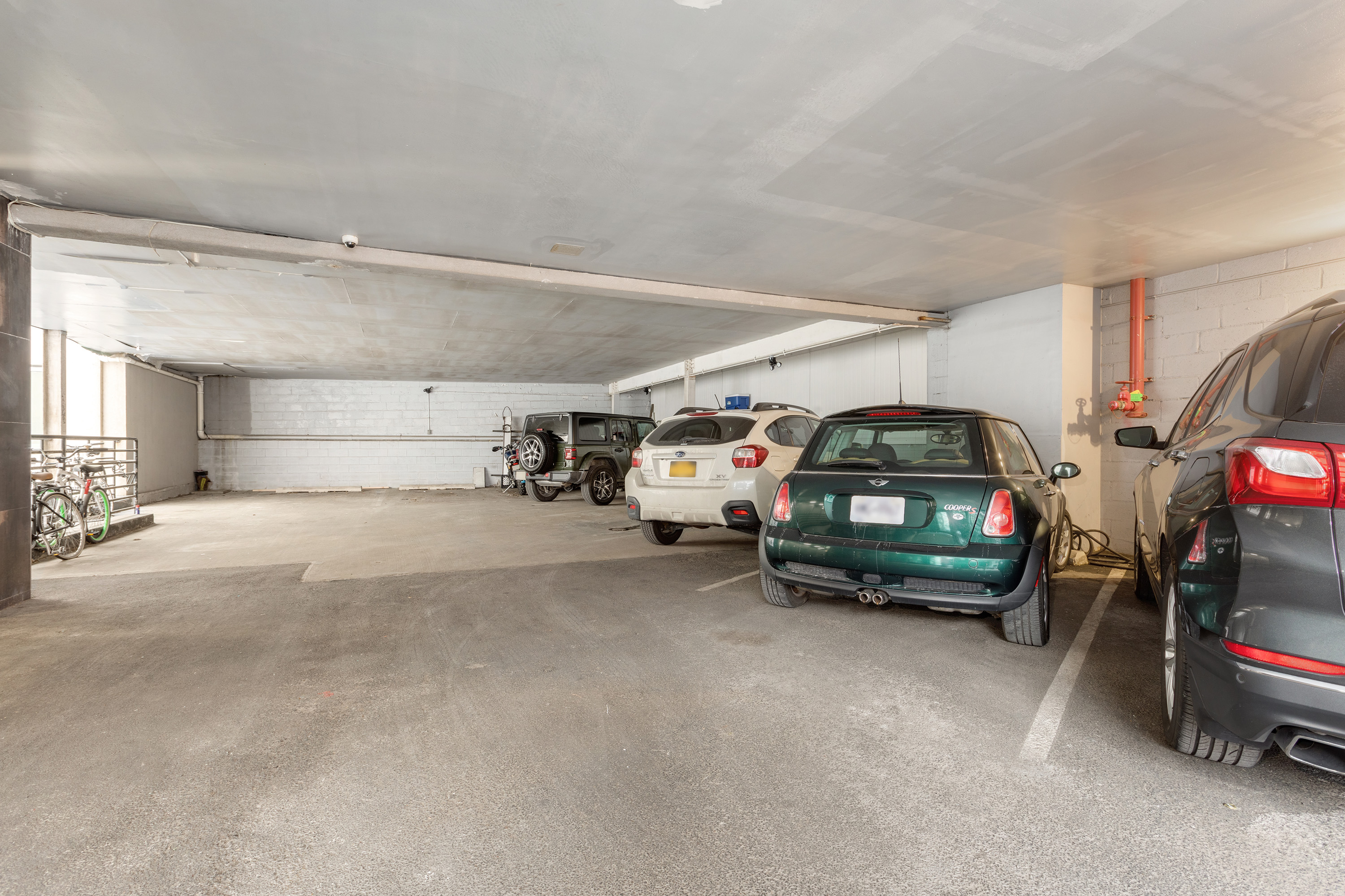 24 Dunham Place, Unit PHA Brooklyn, NY 11249 - Photo 18 of 19 a view of car parking