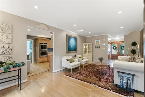 a kitchen with granite countertop cabinets stainless steel appliances and a counter space