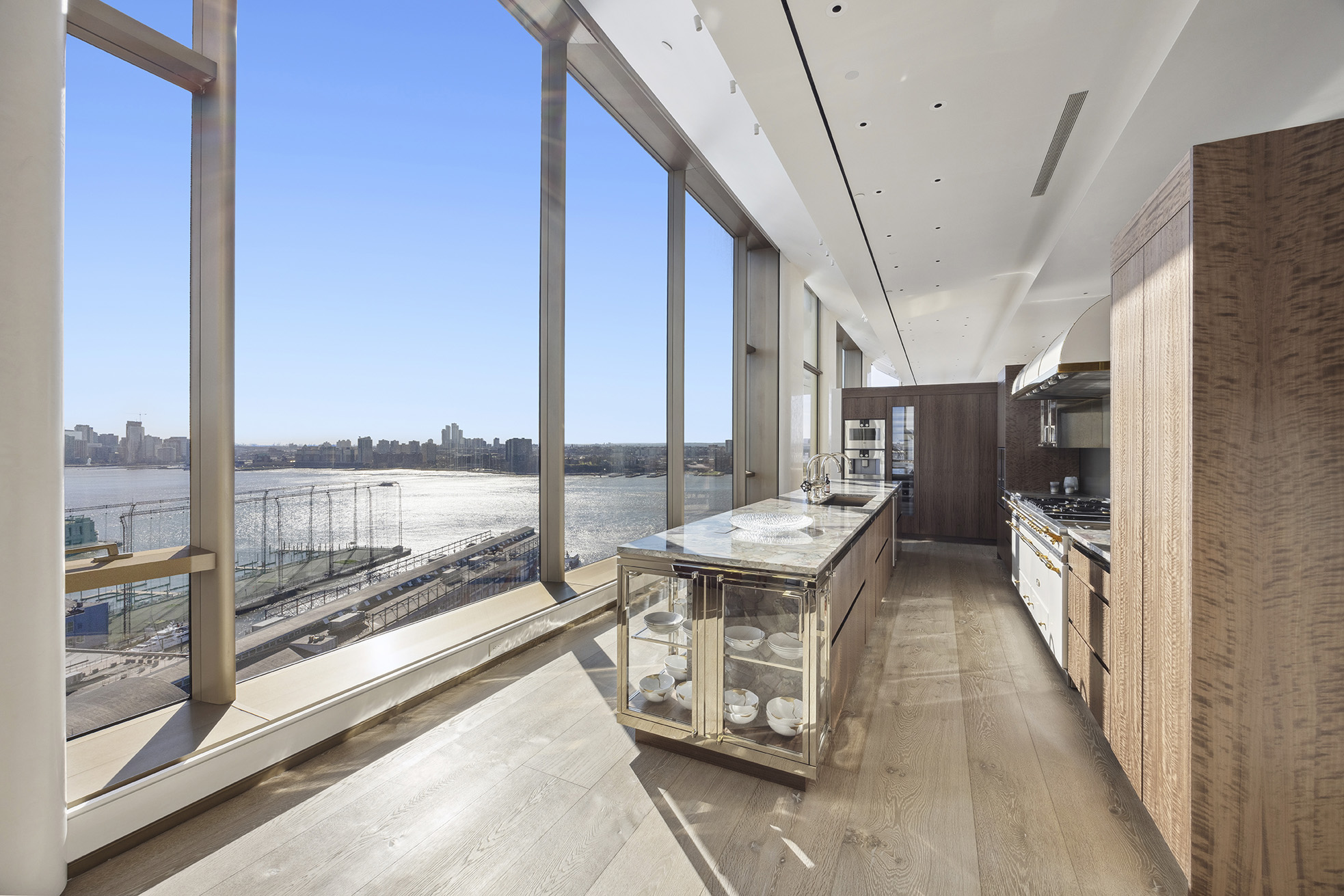 551 West 21st Street, Unit PH Manhattan, NY 10011 - Photo 18 of 51 a dining room with furniture and a floor to ceiling window