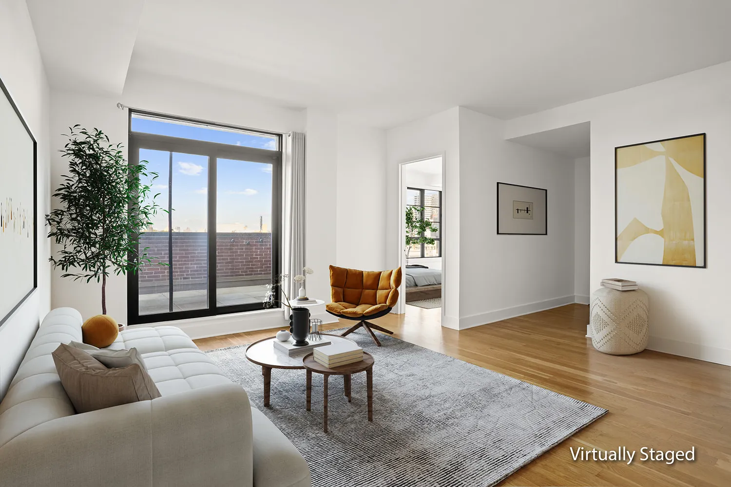 a living room with furniture and wooden floor