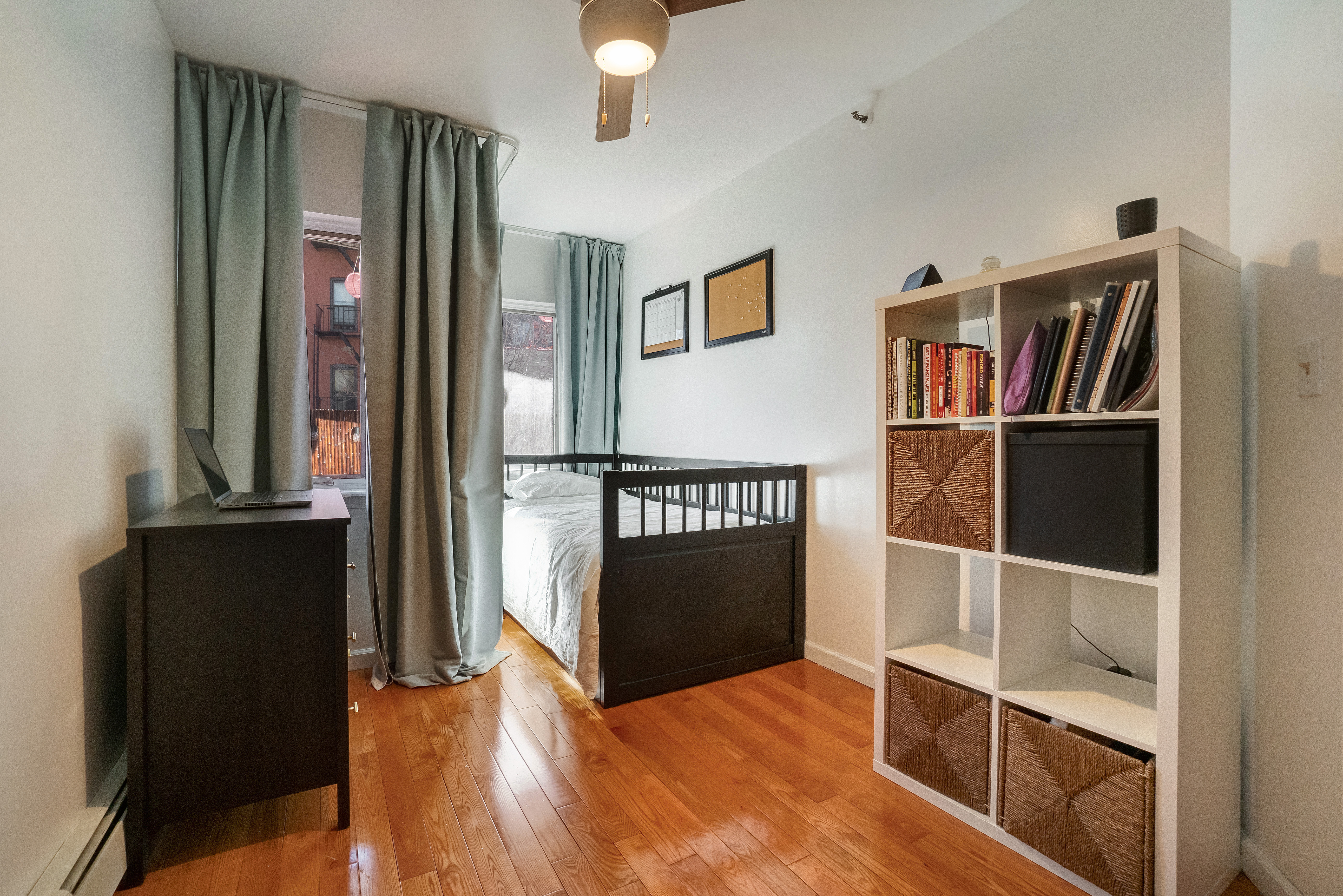 1570 Prospect Place, Unit 3 Brooklyn, NY 11233 - Photo 8 of 10 a view of a hallway with wooden floor and closet