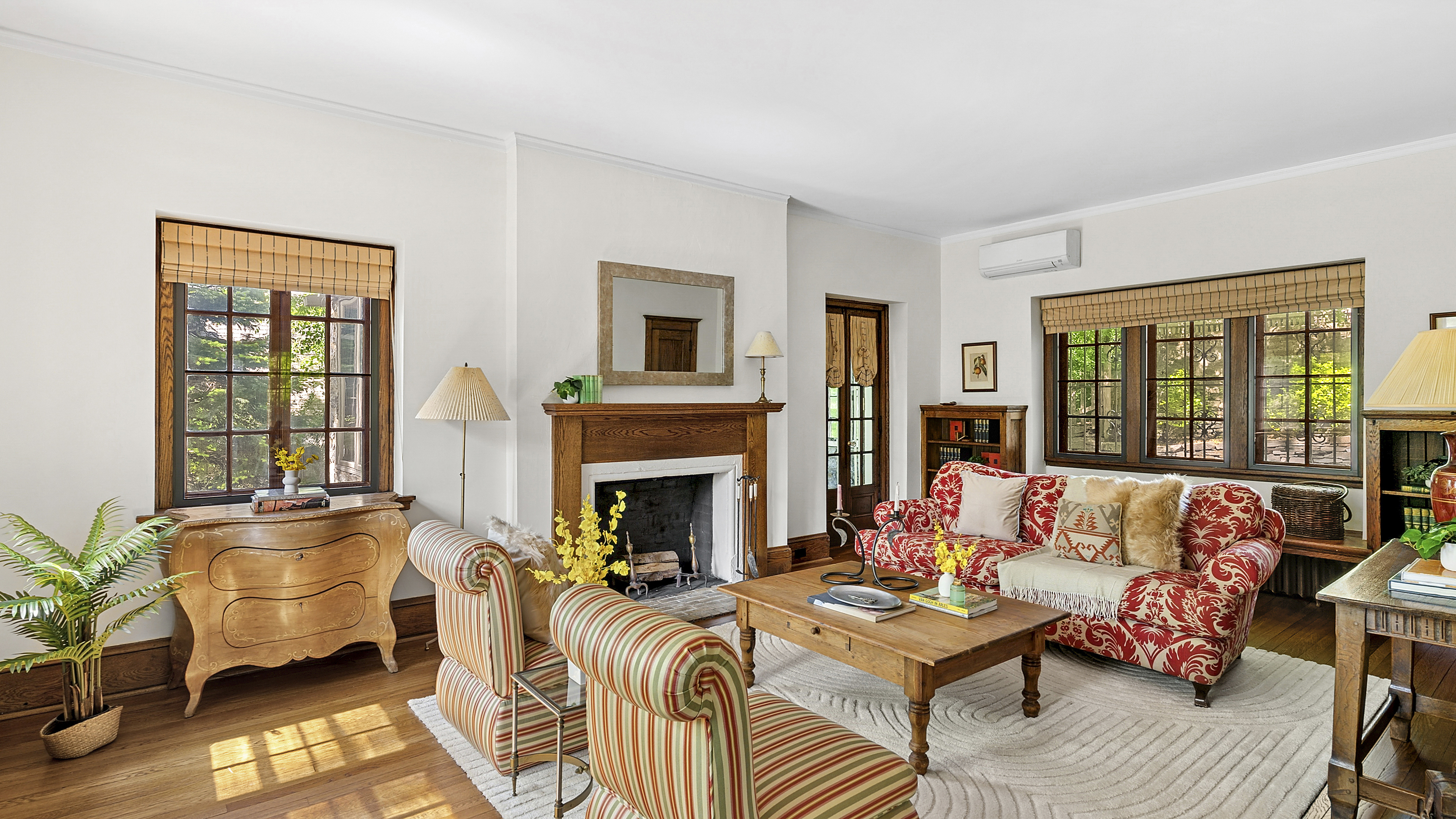 4417 Tibbett Avenue Bronx, NY 10471 - Photo 3 of 20 a living room with furniture and a fireplace