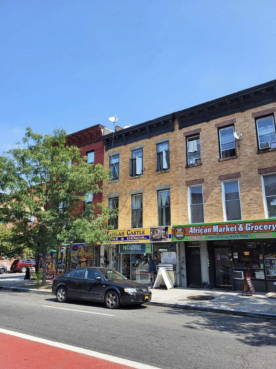 385 Nostrand Avenue, Unit Undisclosed Brooklyn, NY 11216 - Photo 2 of 27 a car parked in front of a building