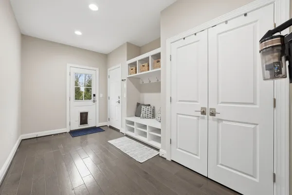 a living room with fireplace furniture and a flat screen tv