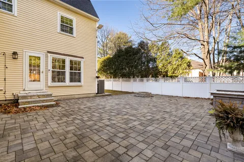 a view of a backyard of the house