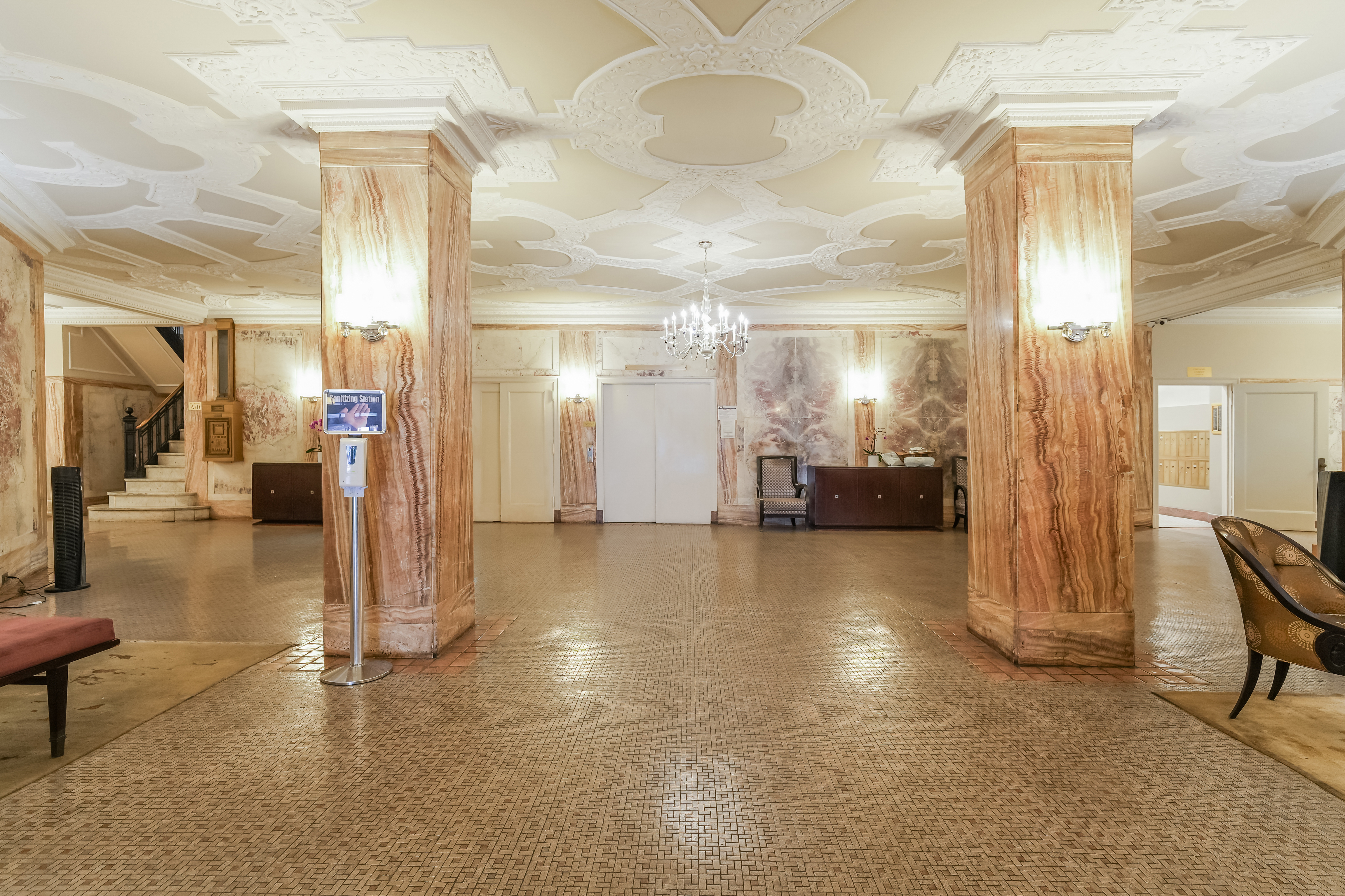 240 West 98th Street, Unit 3D Manhattan, NY 10025 - Photo 11 of 12 a view of a hallway with dining area and chandelier