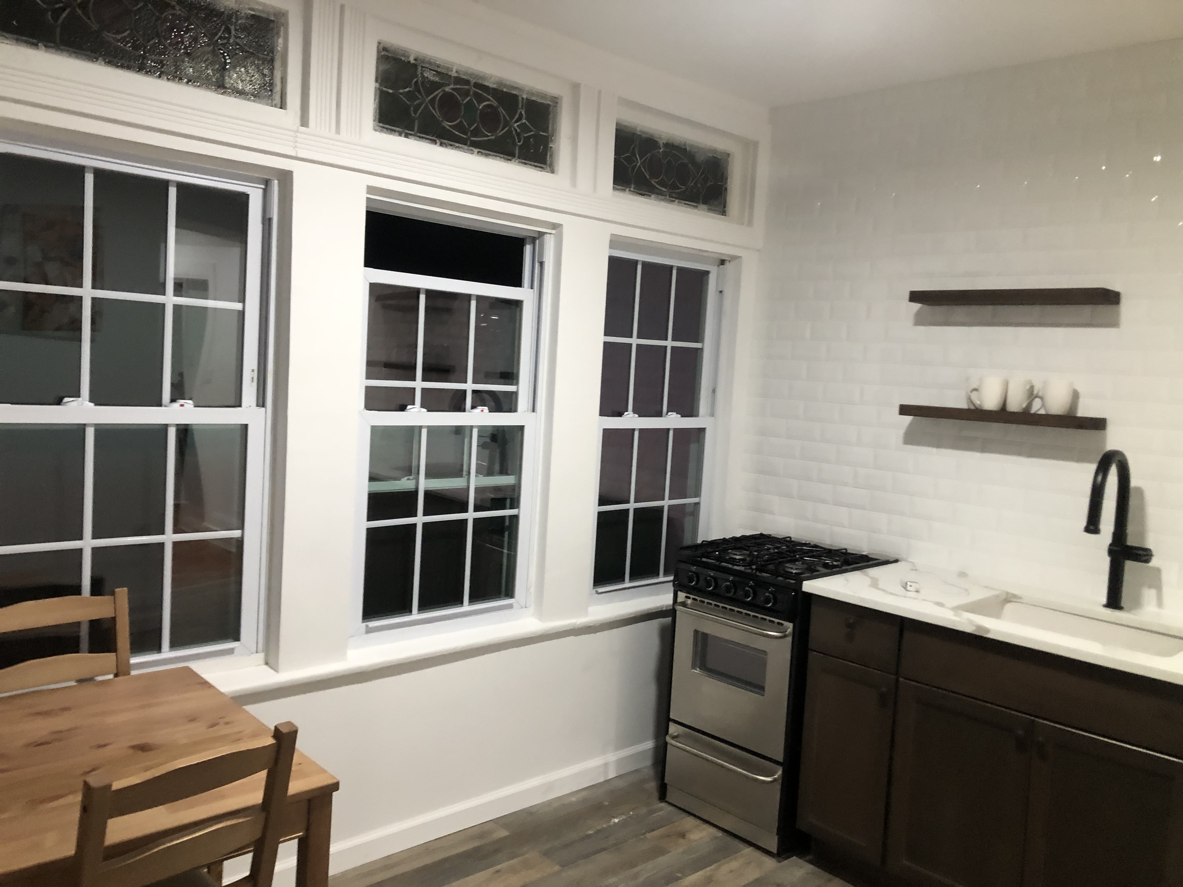 1112 Beverley Road Brooklyn, NY 11218 - Photo 37 of 53 a kitchen with a sink cabinets and window