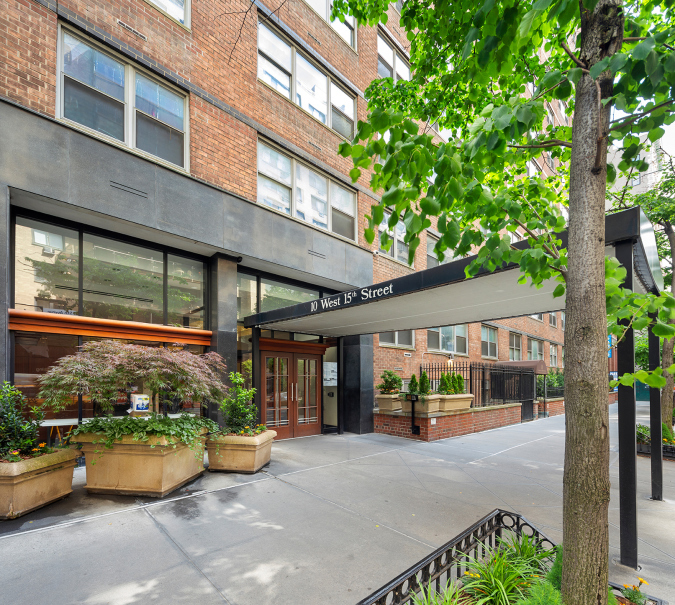 10 West 15th Street, Unit 1027/1028 Manhattan, NY 10011 - Photo 13 of 15 a view of a chair and table in the house front view