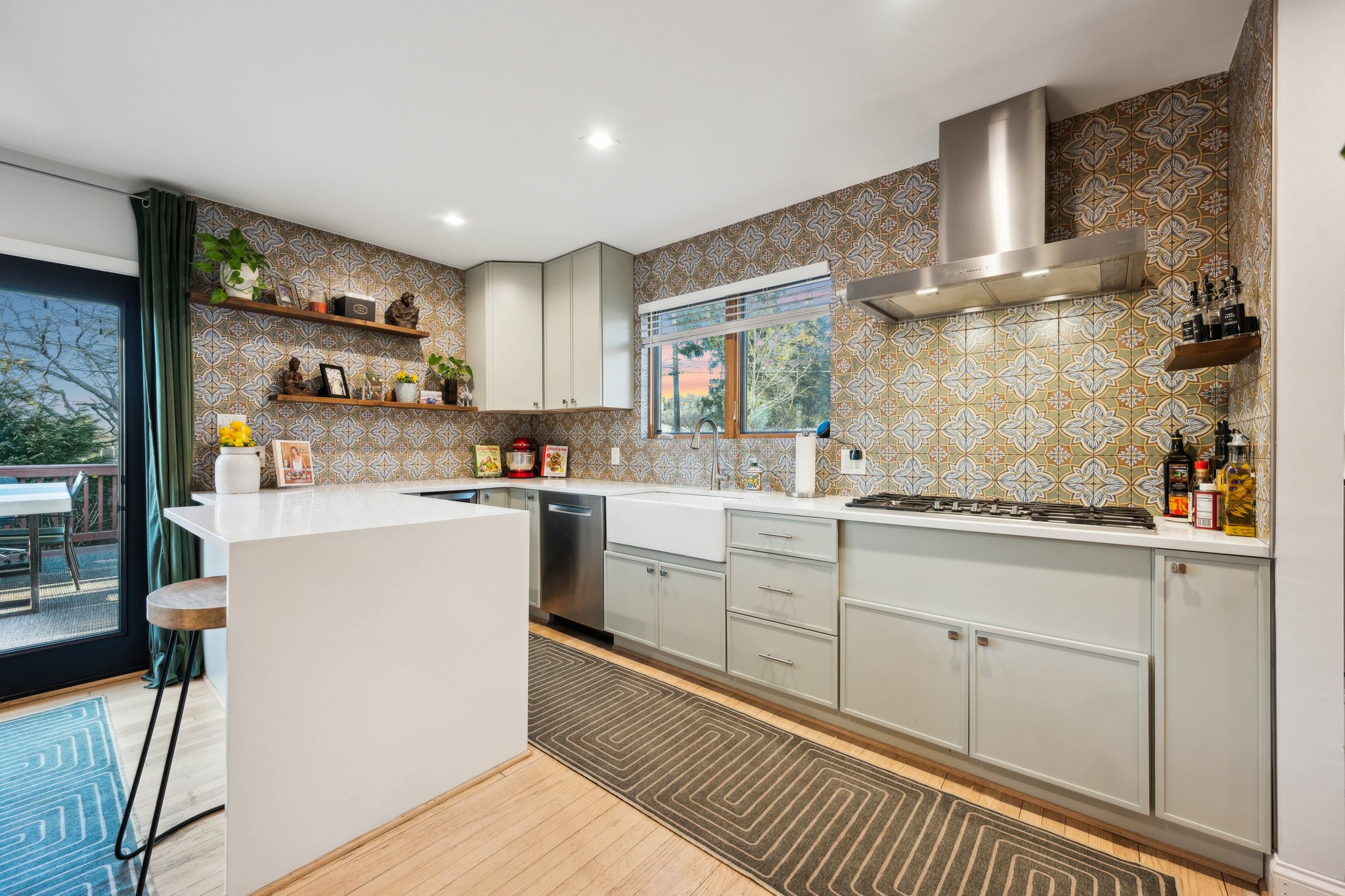 2607 Ross Road Chevy Chase, MD 20815 - Photo 8 of 37 a kitchen with white cabinets and appliances