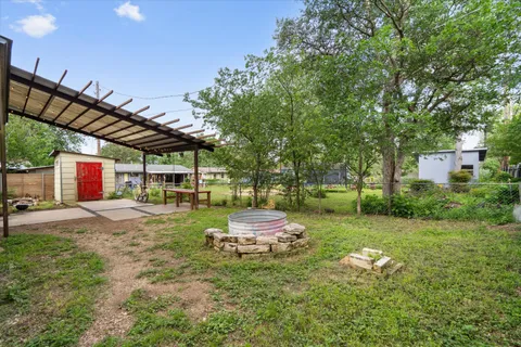 a view of backyard with green space