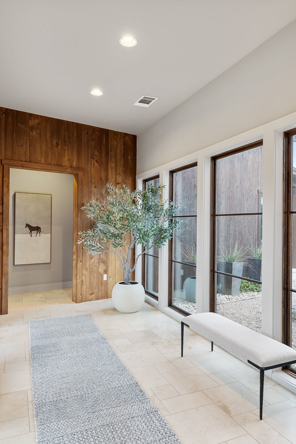2560 Bell Springs Road Dripping Springs, TX 78620 - Photo 36 of 42 a living room with furniture and a potted plant