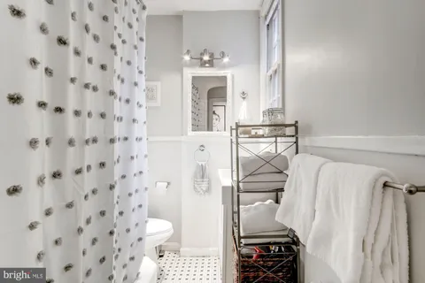 a bathroom with a sink and a shower