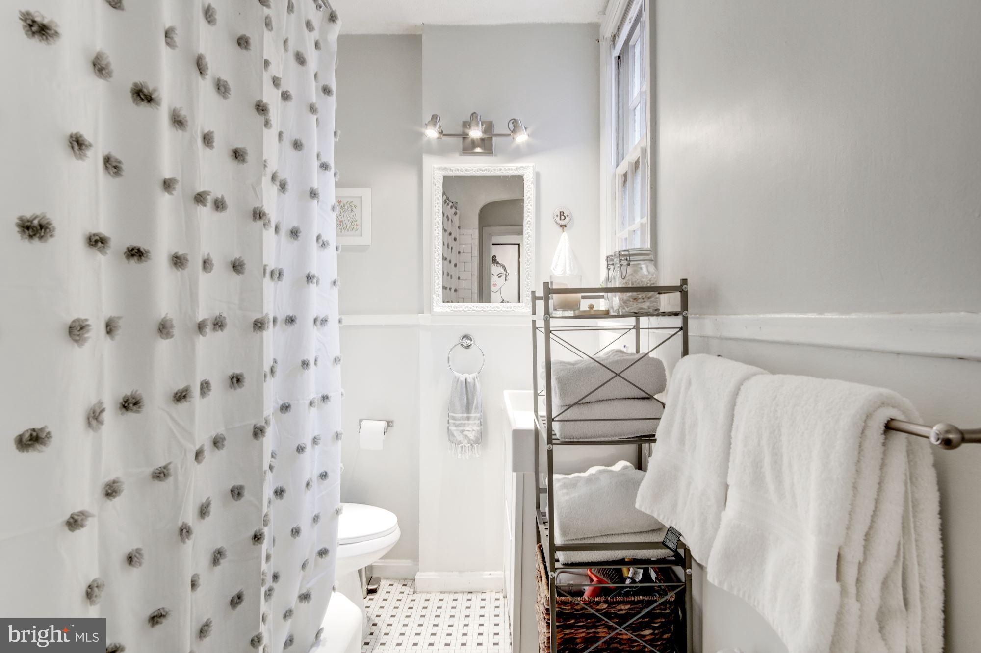 731 13th Street Northeast Washington, DC 20002 - Photo 24 of 43 a bathroom with a sink toilet and shower