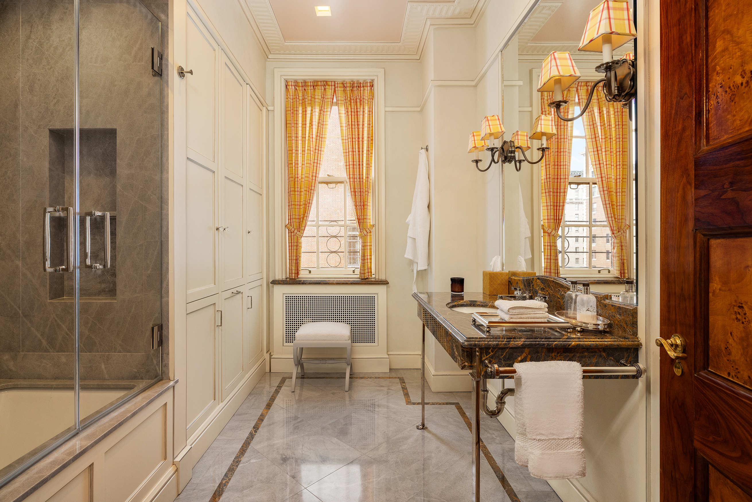 778 Park Avenue, Unit 8 Manhattan, NY 10021 - Photo 17 of 20 a room with a table and a window